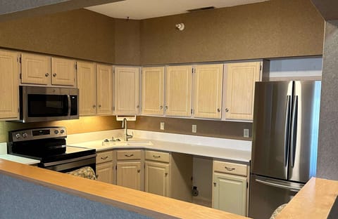 Suite, 1 King Bed, Non Smoking, Kitchen (Full Kitchen) | Desk, laptop workspace, iron/ironing board, WiFi