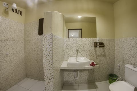 Family Suite, 4 Bedrooms, Balcony, Ground Floor | Bathroom | Free toiletries, hair dryer, towels, toilet paper