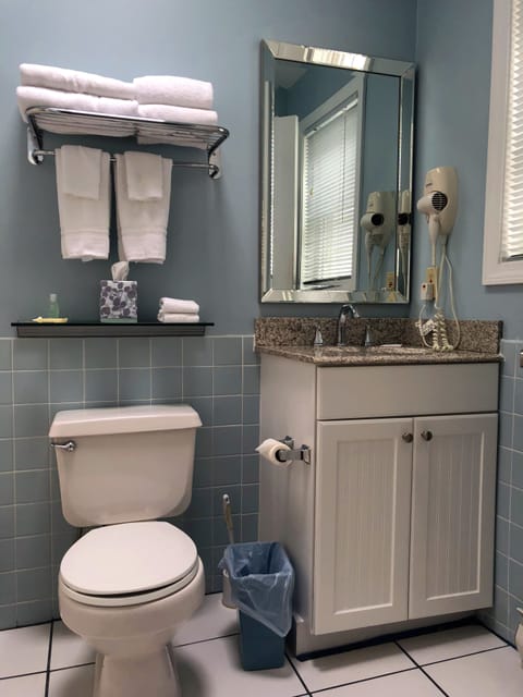 Studio, Multiple Beds | Bathroom | Combined shower/tub, deep soaking tub, free toiletries, hair dryer