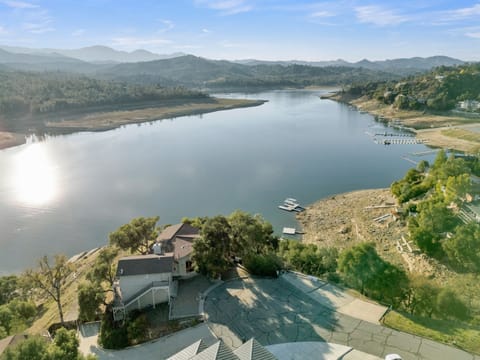 Situated on a quiet cul-de-sac on a point overlooking the lake