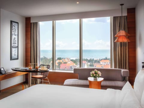 Deluxe Room, 1 King Bed, Sea View | 1 bedroom, premium bedding, minibar, in-room safe