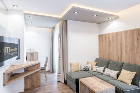 Luxury Double Room, Mountain View | Living area | Flat-screen TV, heated floors