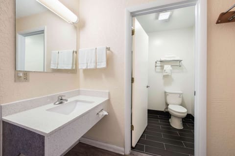 Standard Room, 2 Queen Beds, Non Smoking | Bathroom | Combined shower/tub, hair dryer, towels