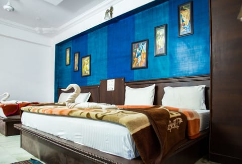 Big Family Four Bedded Room | Living area | Flat-screen TV