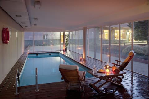 Indoor pool, open 9:00 AM to 6:00 PM, sun loungers