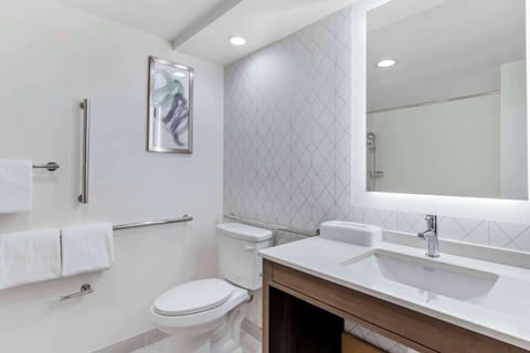 Desk, laptop workspace, blackout drapes, iron/ironing board