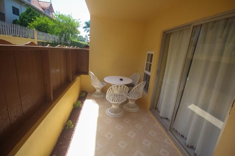 Deluxe Room, Garden Area | Terrace/patio