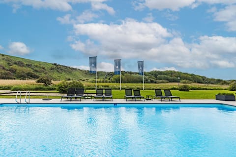 Glide into refreshing water with easy steps and wide deck space.