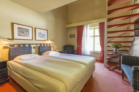 Settle into a warm, inviting room with charming details.