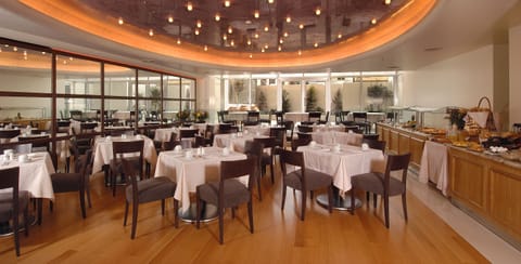 Lunch, dinner served; Mediterranean cuisine, garden views