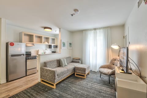 Suite, 2 Bedrooms | Individually furnished, desk, laptop workspace, iron/ironing board