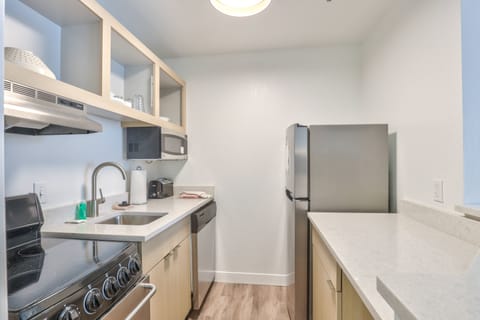 Suite, 1 Bedroom | Private kitchen | Fridge, microwave, stovetop, dishwasher