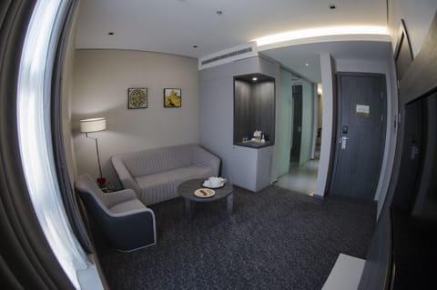 Suite, 1 King Bed | Living area | LED TV