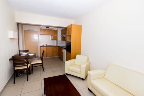 Apartment, 1 Bedroom | Living room | 0-inch flat-screen TV with digital channels, TV