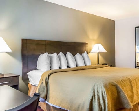 Desk, blackout drapes, iron/ironing board, free cribs/infant beds