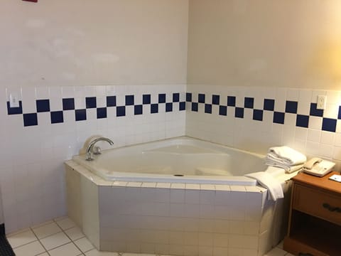 Standard Room, 1 King Bed, Non Smoking | Deep soaking bathtub