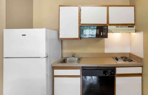 Suite, 1 Queen Bed with Sofa bed, Non Smoking | Private kitchen | Full-size fridge, microwave, stovetop, dishwasher