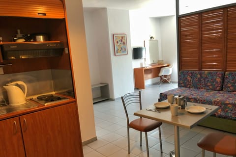 Studio, Pool View | Private kitchen | Fridge, electric kettle, cookware/dishes/utensils