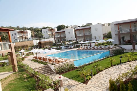 Outdoor pool, open 8:00 AM to 8:00 PM, pool umbrellas, sun loungers