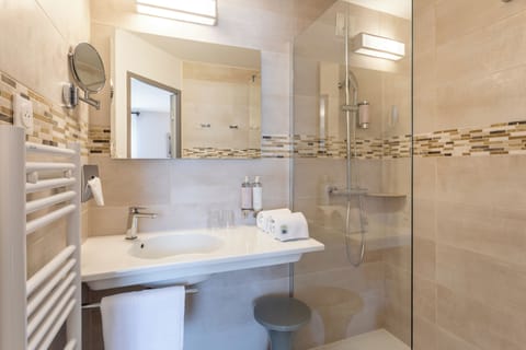 Shower, rainfall showerhead, designer toiletries, hair dryer