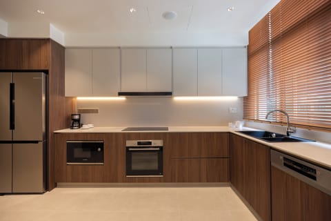 Penthouse | Private kitchen | Fridge, microwave, stovetop, coffee/tea maker