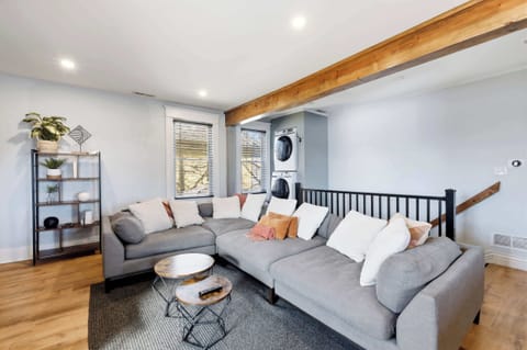 Living Area 2: Living Room 2 offers plenty of seating with its wide and comfortable sofa.