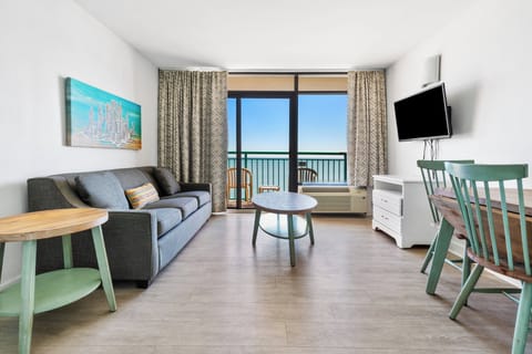 Oceanfront One Bedroom Suite with King Bed | Desk, laptop workspace, iron/ironing board, free cribs/infant beds