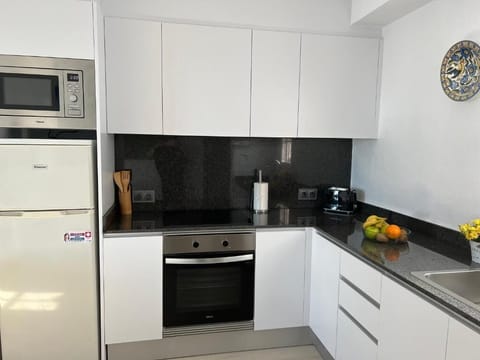 Family Apartment, 2 Bedrooms, Terrace, Sea View | Private kitchen | Fridge, microwave, stovetop, coffee/tea maker