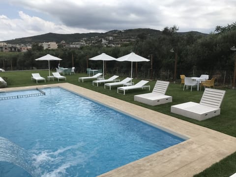 Seasonal outdoor pool, sun loungers