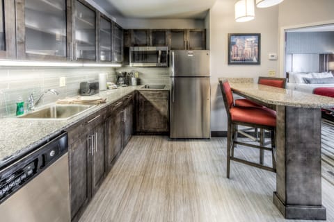 Full-size fridge, microwave, stovetop, coffee/tea maker