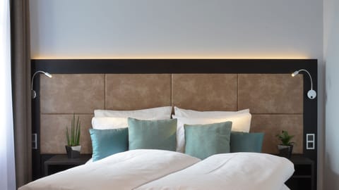 Premium bedding, in-room safe, desk, soundproofing