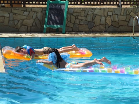 Seasonal outdoor pool, pool umbrellas