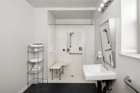 Room, 1 Queen Bed (ADA) | Bathroom | Shower, free toiletries, hair dryer, towels