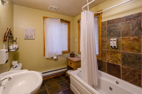 Woodland Vista Cabin (no pets) | Bathroom | Shower, free toiletries, hair dryer, towels