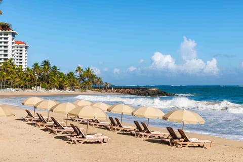 Beach nearby, white sand, sun loungers, beach umbrellas