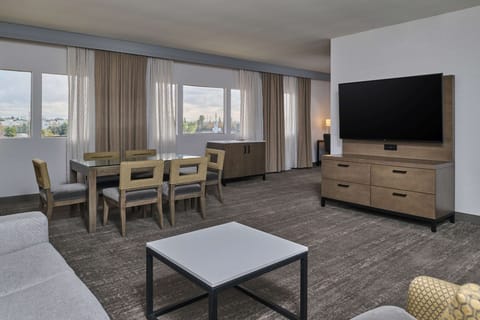 Suite, 1 Bedroom (1 King Bed) | Living area | Flat-screen TV
