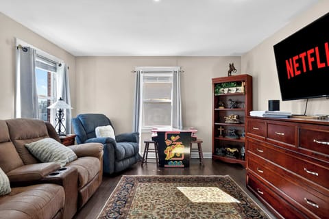 Living Room: A cozy living room designed for relaxing, unwinding, and feeling at home.