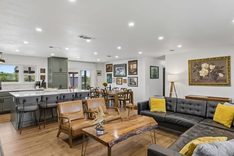 Living Room | Tufted Leather Sectional | Live-Edge Coffee Table