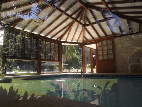 Indoor pool, outdoor pool, pool umbrellas, sun loungers