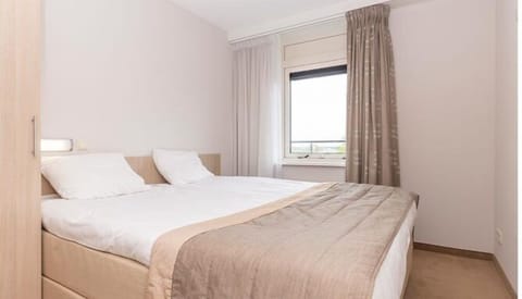 Drift off in a quiet bedroom with soft linens.