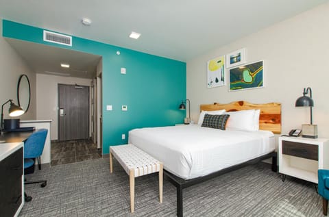 Settle in with a cozy bed and dedicated work desk.