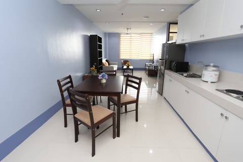 Family Suite, 3 Bedrooms, Accessible, City View | Living room | LED TV