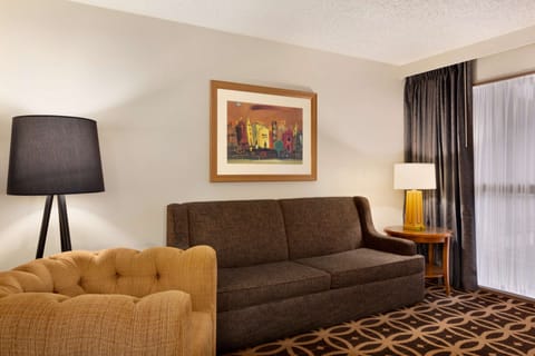 Suite, 2 Queen Beds, Non Smoking | Living area | 37-inch LCD TV with cable channels, TV, MP3 dock