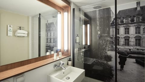 Eco-friendly toiletries, hair dryer, towels