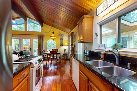 Cook up your favorite dishes in this well-equipped kitchen, designed for both function and a touch of style.