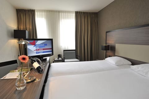 Arrive to a welcoming room with ready-to-relax comfort and space.