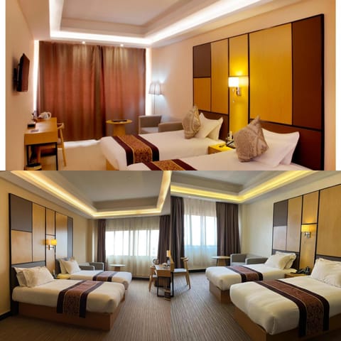 Business Twin Room, City View | Minibar, in-room safe, desk, laptop workspace