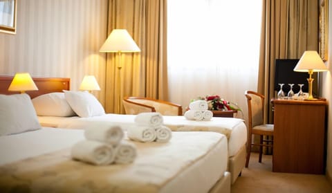 Standard Triple Room, 1 Bedroom | Premium bedding, minibar, in-room safe, desk