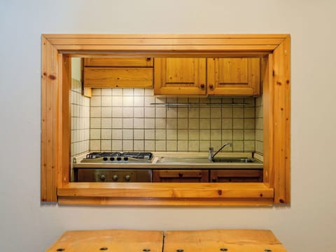 Wood, Interior Design, Flooring, Kitchen, Ceiling, Floor, Room, Wood Stain, Countertop, Hardwood