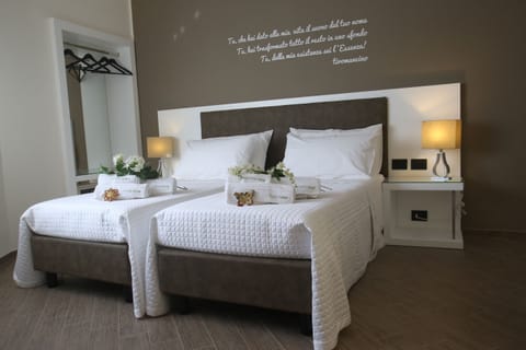 Deluxe Triple Room, Sea View | Frette Italian sheets, premium bedding, minibar, in-room safe